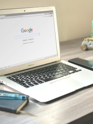 Macbook Air on Grey Wooden Table